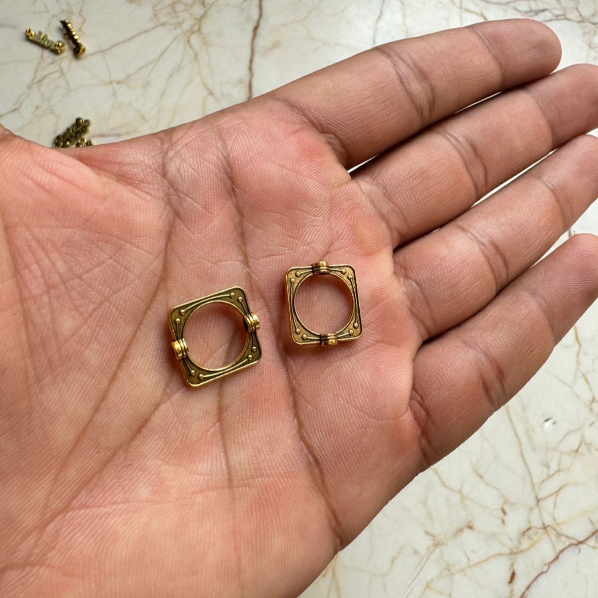 Rakhi metal charms Designer