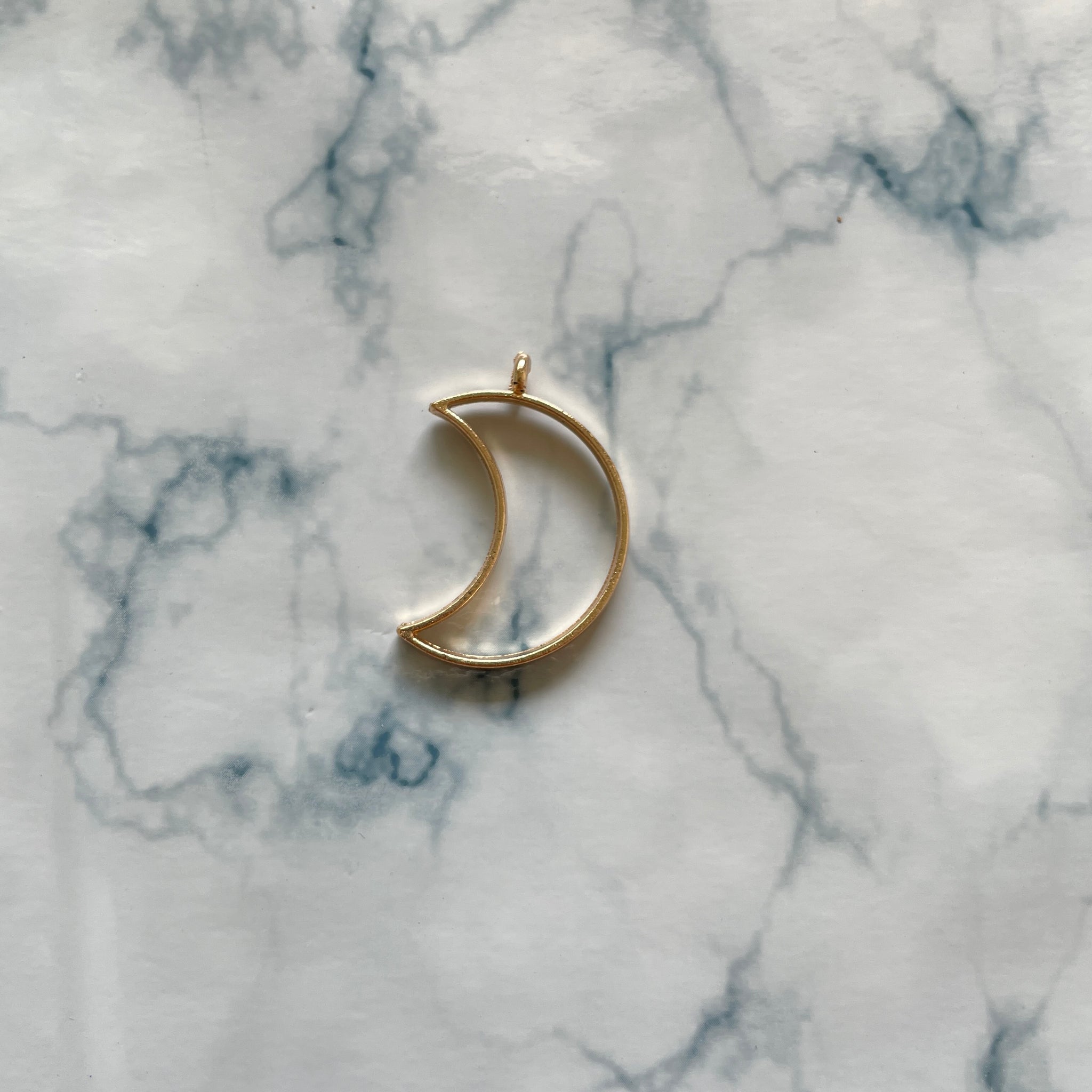 Moon shaped  gold open bezel