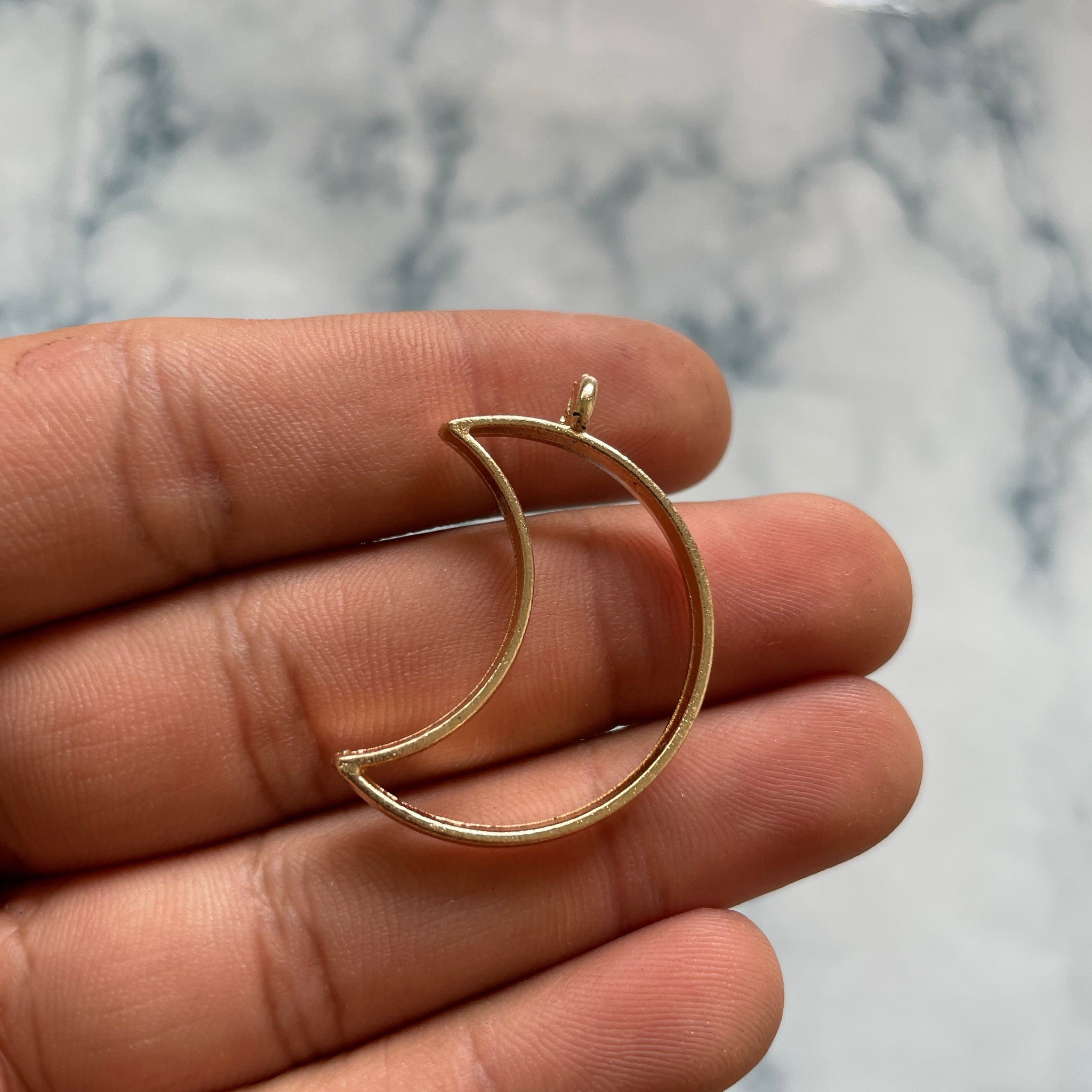 Moon shaped  gold open bezel